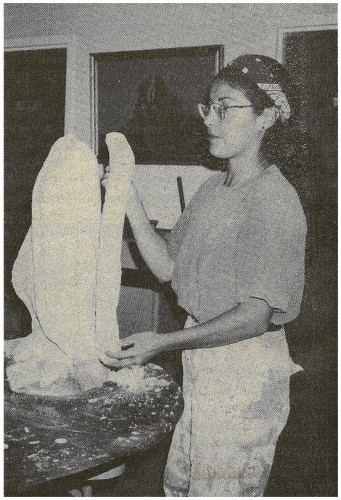 MAKING A MOLD - Ana Neighbor, one of the instructors at the Second Annual Stone Carving Symposium, works on a mold made from a stone sculpture. Photo by Rebecca Grandbois/Jemez Thunder