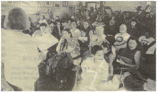 POETRY READING - Kathleen Wiegner (left) read some of her poems at the annual Open Mike Poetry Reading on April 25 at the Laughing Lizard Cafe. About 75 people attended the popular event, sponsered by the Jemez Springs Public Library. Kathleen, the editor of the Jemez Thunder, is also the author of three books of poetry, Encounters (1972), Country Western Breakdown (1974) and Freeway Driving (1981). Photo by Robert Borden/Jemez Thunder