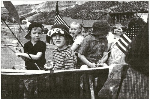 Among the young fisher people aboard the church float on July Fourth were, left to right, Iain and Emily Jaramillo, Heather Powdrill and Shannon Kilburg. Also aboard were Martin Dole and Mahan Deeds. Adult riders included Charlie Allen, Rosemary Cart, Gaye Fahringer, Thelma O’Neil, Melissa Jaramillo, Dick Lake and Barbara Curran.